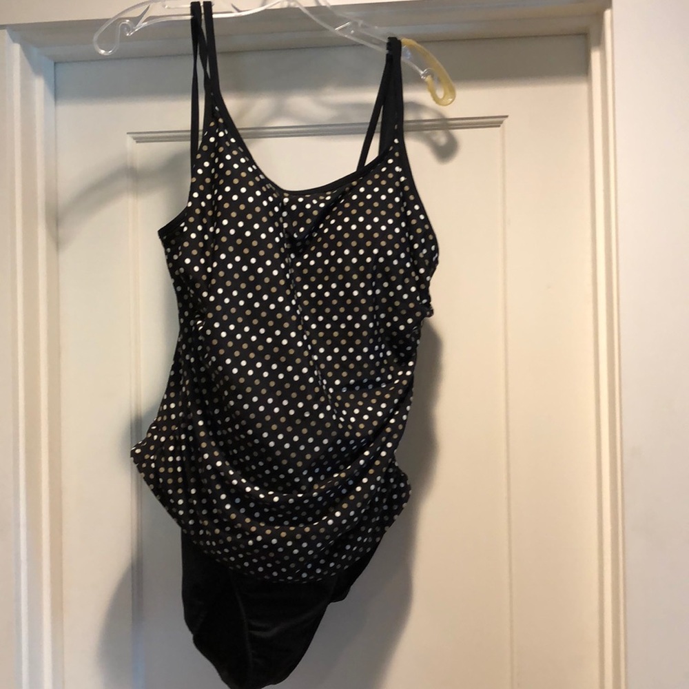 Miracle suit one piece. Size is 16L.